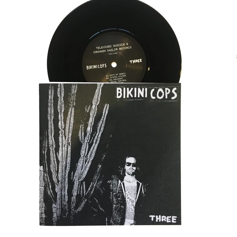 Bikini Cops: Three 7" (new)