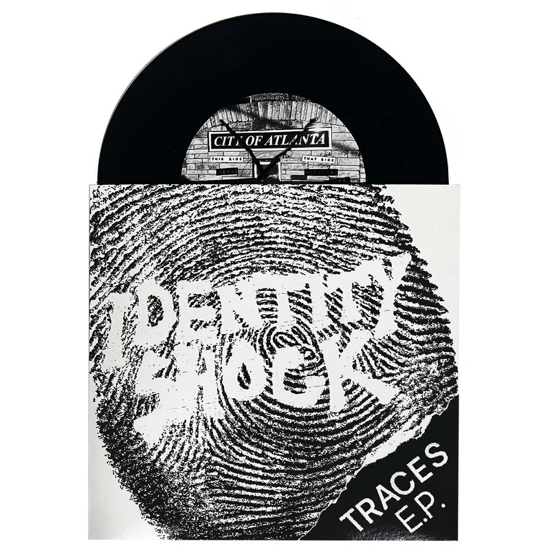 Identity Shock: Traces E.P. 7"