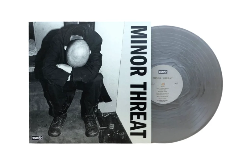 MINOR THREAT 'FIRST 2 7"s' (self titled) 12" EP - SILVER