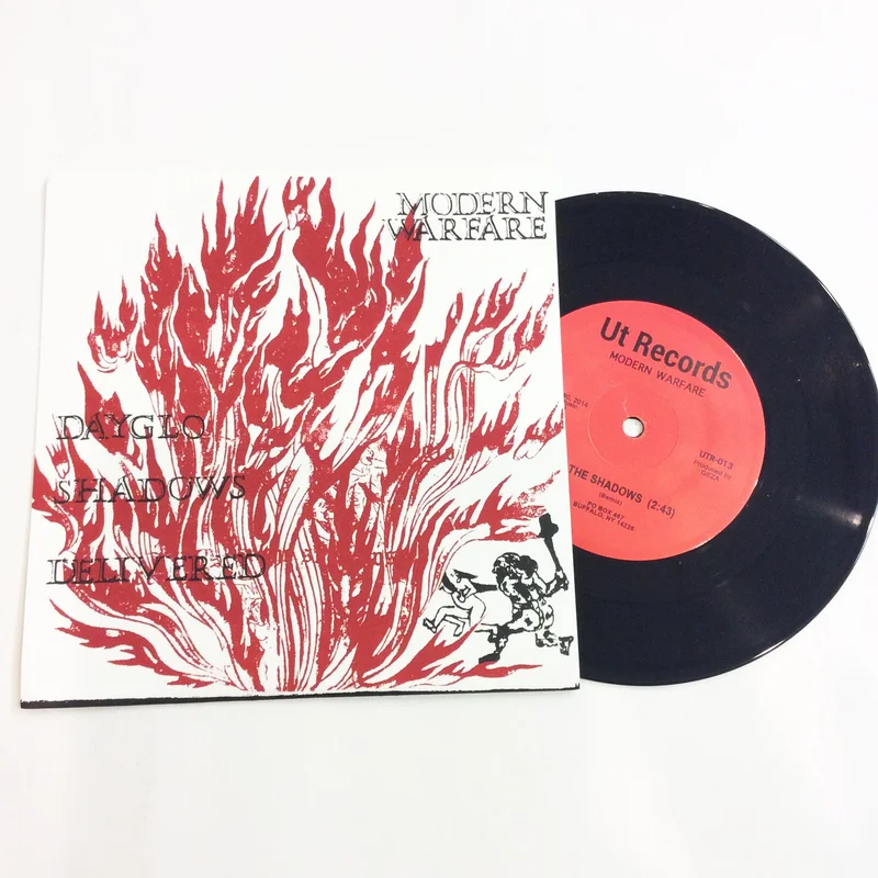 Modern Warfare: Dayglo Shadows Delivered 7"